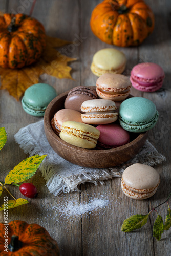 Multicolored macarons on a wooden table
