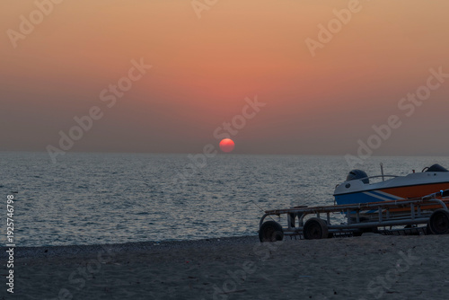 spectacular sunrise and sunset over the sea