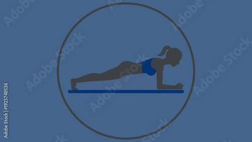Woman performing a plank exercise in a fitness studio.