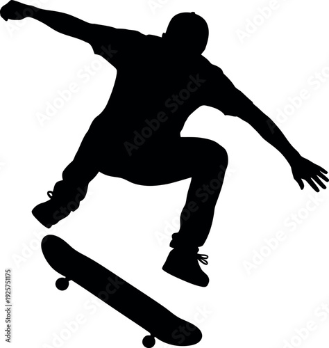 Silhouette of a skateboarder performing a trick in mid air