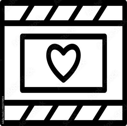 Photo frame or film cutout with heart detail in the center for romantic photo print decoration and social media design.