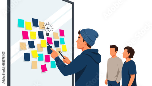 Team brainstorming session with sticky notes on glass board