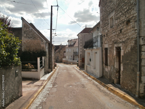 Courson-les-carrières, France - August 4th 2013 : View of a rural street of this small village. This place is home to many farmers, and very close to stone quarries.