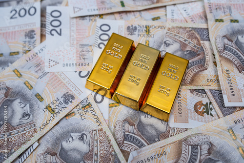 Gold Bullion On Polish 200 Zloty Banknotes Finance And Investment Background