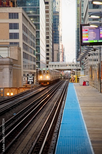 Wallpaper Mural View of Chicago Subway with Buildings flanking the tracks at Sunrise Torontodigital.ca
