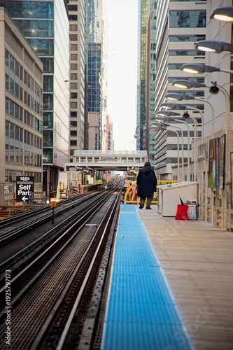 Wallpaper Mural View of a person walking down the street with Chicago Buildings in the background at Sunrise Torontodigital.ca