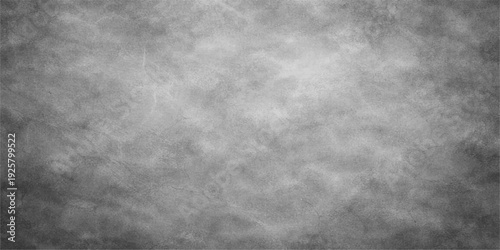 A dark and dirty grunge metal texture featuring a rough black and white vintage pattern on a gray wall backdrop with subtle smoke effects for a distressed industrial design