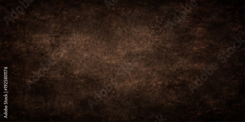A dark grunge background with an aged brown paper texture and dirty vintage wall pattern creates an antique parchment surface for a blank retro design backdrop