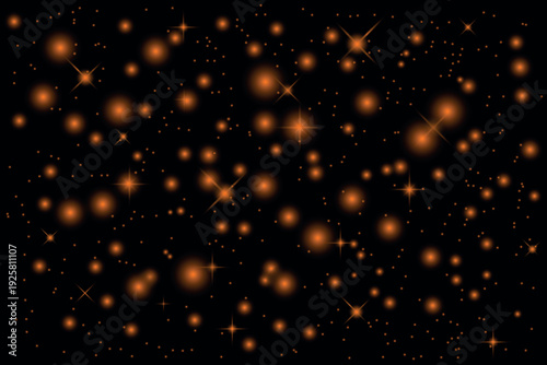 A blurry image of numerous orange and white dots against a black background