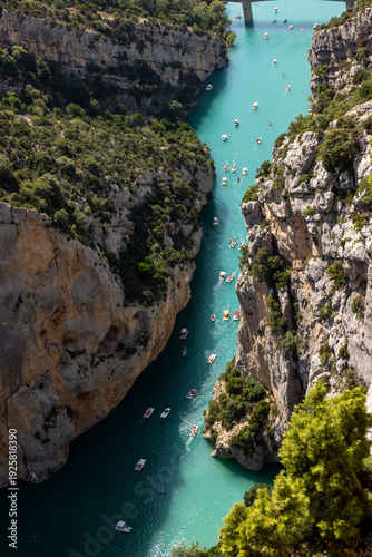 Tourists explore the Verdon Gorge in pedal boats, kayaks and paddle boats. An ideal place for an active holiday in Provence-Alpes-Côte d'Azur, France.