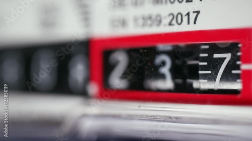 Wallpaper Mural Close up of a mechanical counter displaying rotating numbers Torontodigital.ca