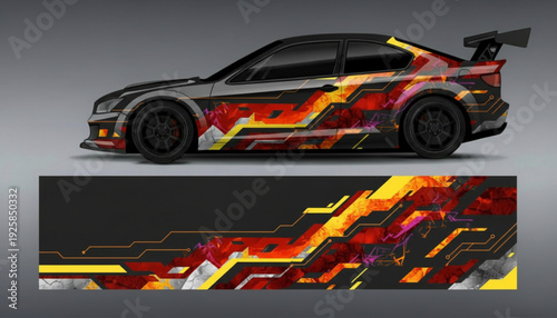 Black sports car with fiery abstract geometric decal design.