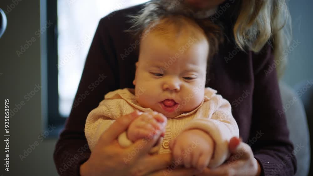 custom made wallpaper toronto digitalClose up of a baby sitting on an adult's lap indoors while gently holding hands