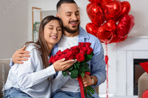 Beautiful young couple with...