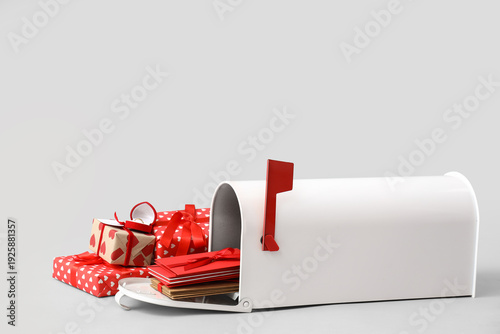 Mailbox with letters and gi...