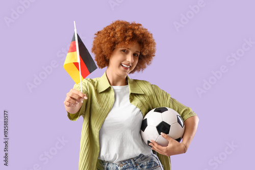 Young female soccer fan wit...
