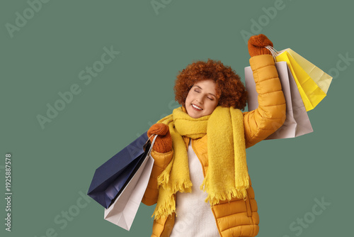 Happy redhead young woman i...