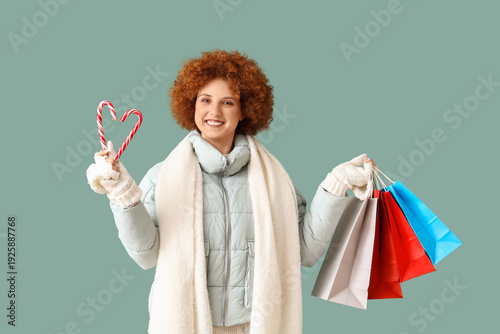Redhead young woman in wint...