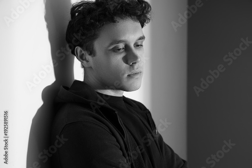 Sad young man at home, clos...