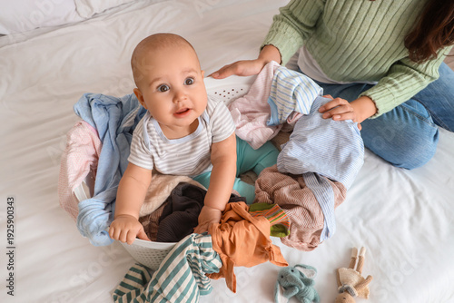Cute little baby in laundry...