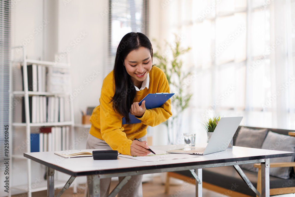 Fototapeta premium businesswoman Accounting using calculating income-expenditure and analyzing real estate investment data report Financial and tax systems concept. 