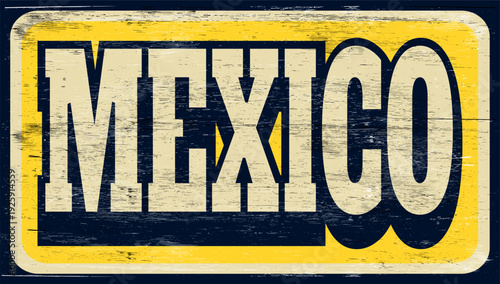 Aged vintage Mexico sign on wood