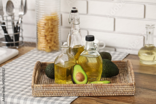 Bottles of fresh avocado oi...