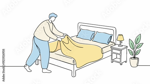 Man making bed in bedroom with yellow blanket.