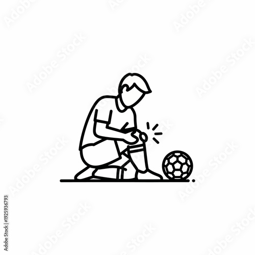 A soccer player injured knee, sitting beside a soccer ball. The pain around his knee is visible