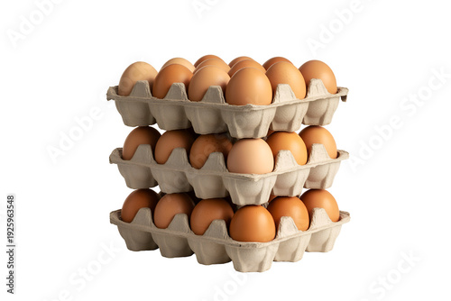 Stack of brown eggs in cardboard cartons