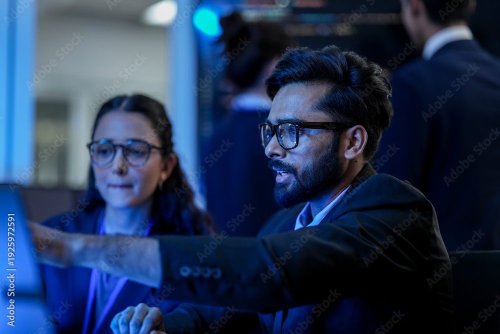 Wall Mural Senior cybersecurity analyst executing digital forensic investigation on network breach