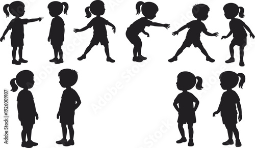 Black silhouettes of primary school children playing and talking set isolated on white background for educational posters community graphics and childhood development projects