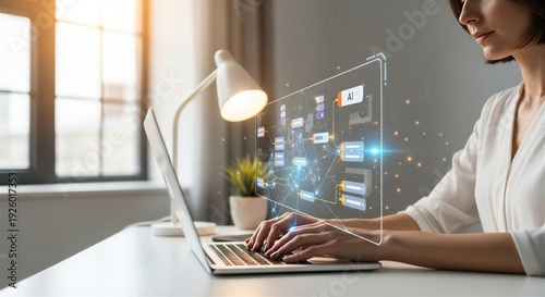 Woman working on laptop with AI interface in modern office