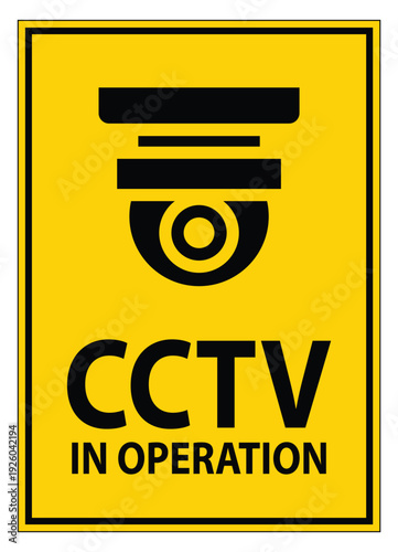 Yellow Notice Sign Indicating CCTV Surveillance In Operation Outdoors