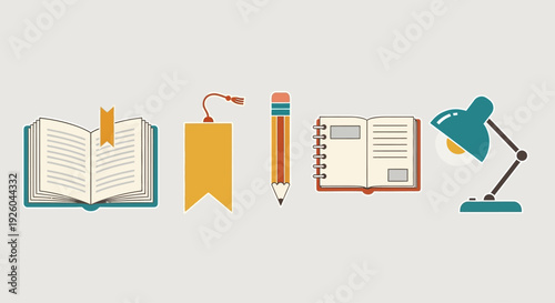 Stationery items including a book, bookmark, pencil, notebook, and desk lamp arranged on a flat surface viewed from directly above
