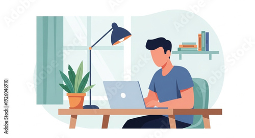 Man working on laptop at desk with lamp and plant.