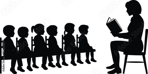 Black silhouette of a female teacher reading a book to a group of young children sitting on a long bench.