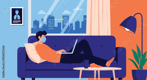 A man wearing a face mask works from home on a laptop while relaxing on a sofa during quarantine or self-isolation period.