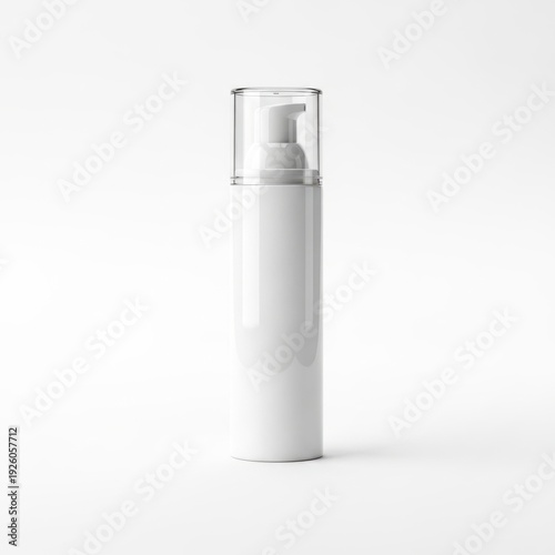 Empty white spray pump bottle standing on a plain background
