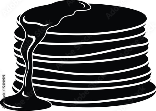 Syrup pouring on a stack of pancakes