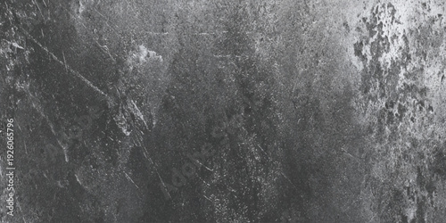 A abstract wall image displaying a heavily textured surface with mottled patterns and indistinct shapes