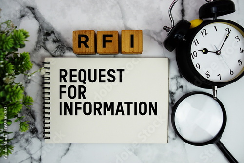 RFI Request For Information text with alarm clock and magnifying glass on marble background