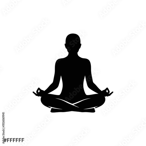 A person sitting in a meditative pose on the floor