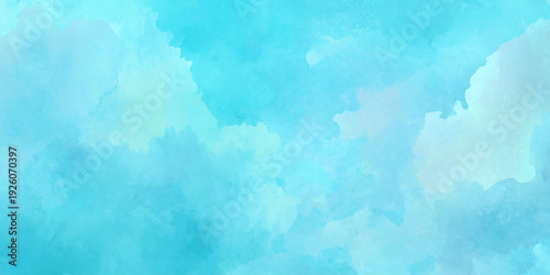 A beautiful watercolor wash of light turquoise and white creating a soft dreamy and abstract background texture