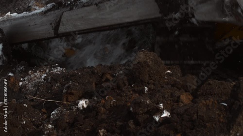 Wallpaper Mural Detailed Perspective Of Wet Muddy Earth And Snow Congested With Construction Equipment Atmosphere . Stock clip Torontodigital.ca