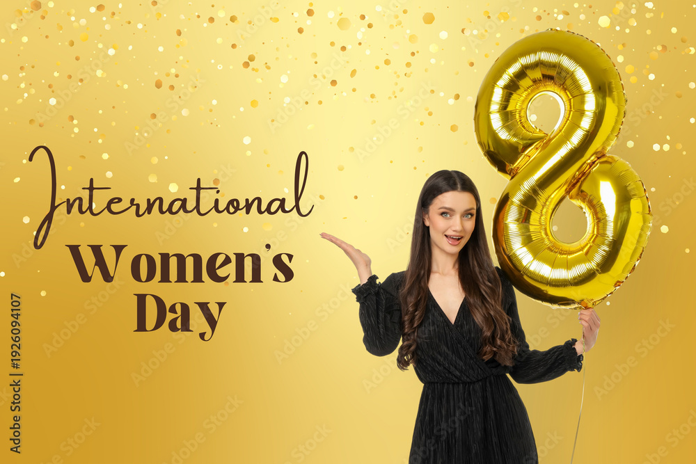 Fototapeta premium Young woman holds golden balloon for Women’s Day