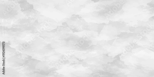 Fluffy white clouds drift across a bright blue summer sky, creating a beautiful natural texture in the clear atmosphere of a sunny day