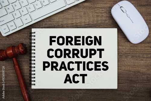 Принти на полотні FCPA Foreign Corrupt Practices Act text written on notepad with gavel and keyboa