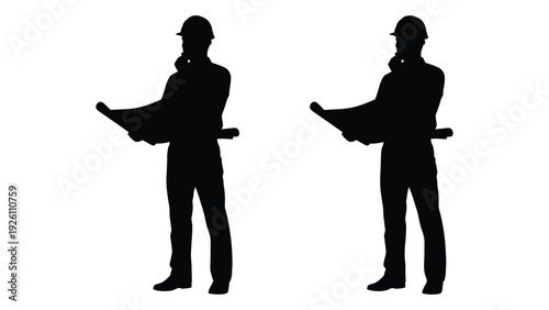 Silhouettes of two people examining blueprints likely architects or engineers