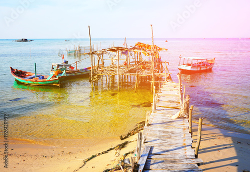 Photos Boat at pier in sea